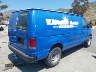 2003 Ford Econoline Cargo with VIN 1FTNE24223HA50404, listed as a IAAI auction lot 42087224 with 210,418 mi miles. Bid and sale history available at carsss.com. Image 4.