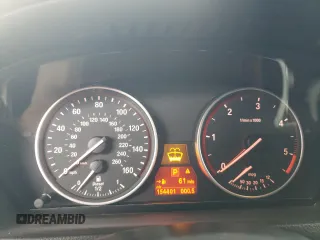2012 BMW X5 35d with VIN 5UXZW0C53CL671564, listed as a Copart auction lot 60880715 with 154,401 mi miles and Clean title. Bid and sale history available at DreamBid. Image 9.