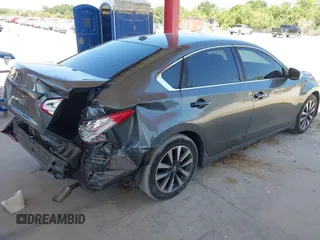2016 Nissan Altima S with VIN 1N4AL3AP7GC294942, listed as a IAAI auction lot 42072679 with 125,371 mi miles and . Bid and sale history available at DreamBid. Image 4.
