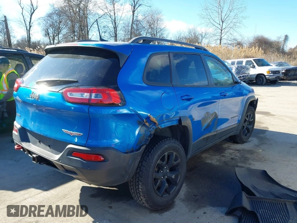 2018 Jeep Cherokee Trailhawk with VIN 1C4PJMBX7JD507453, listed as a IAAI auction lot 41464420 with 100,369 mi miles and . Bid and sale history available at DreamBid. Image 4.