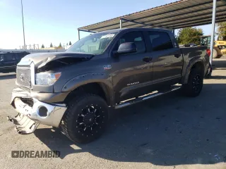 2012 Toyota Tundra 4WD Truck with VIN 5TFDW5F18CX256122, listed as a Copart auction lot 47142355 with 194,668 mi miles and Salvage Title. Bid and sale history available at carsss.com. Image 1.