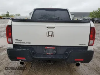 2023 Honda Ridgeline RTL-E with VIN 5FPYK3F78PB015187, listed as a Copart auction lot 57655465 with 57,704 mi miles and Salvage title. Bid and sale history available at DreamBid. Image 6.