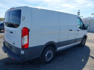 2015 Ford Transit Cargo with VIN 1FTNE1ZM6FKA87497, listed as a IAAI auction lot 41715523 with 180,079 mi miles. Bid and sale history available at carsss.com. Image 4.
