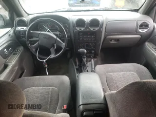 2004 GMC Envoy SLT with VIN 1GKDT13S042310076, listed as a Copart auction lot 79965854 with 220,506 mi miles and Salvage Title. Bid and sale history available at carsss.com. Image 8.