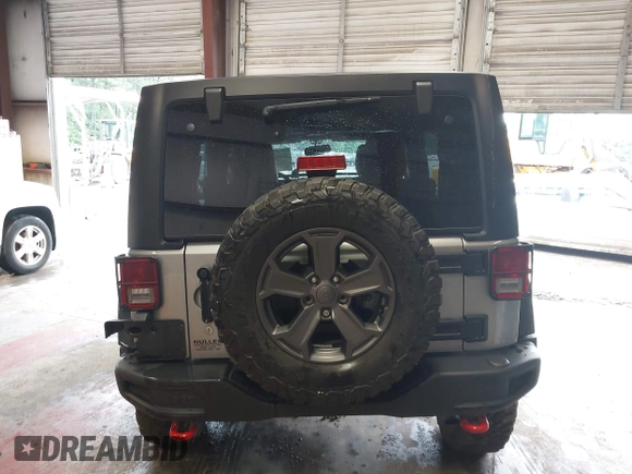 2017 Jeep Wrangler Unlimited Rubicon Recon z VIN 1C4BJWFG5HL687757, wystawiony jako IAAI lot #42367095 z przebiegiem 48 441 mil mil oraz . Historia ofert i sprzedaży dostępna na DreamBid. Obrazek 16.