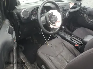 2013 Jeep Wrangler Sport with VIN 1C4AJWAG5DL511269, listed as a Copart auction lot 44527515 with 107,671 mi miles and Salvage title. Bid and sale history available at DreamBid. Image 8.