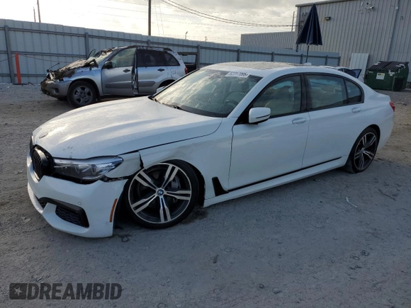 2018 BMW 7 Series 740i with VIN WBA7E2C55JG742869, listed as a Copart auction lot 52317095 with 0 mi miles and Salvage Title. Bid and sale history available at carsss.com. Image 1.