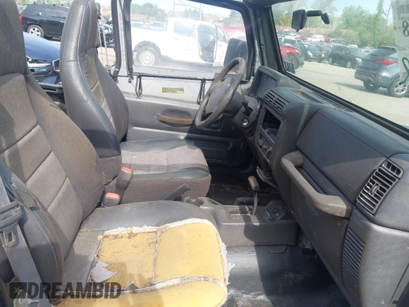 1999 Jeep Wrangler SE with VIN 1J4FY29P3XP469786, listed as a IAAI auction lot 42131018 with 130,918 mi miles and . Bid and sale history available at DreamBid. Image 5.