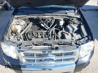 2010 Ford Escape Limited z VIN 1FMCU9E71AKB56741, wystawiony jako IAAI lot #41764959 z przebiegiem 216 816 mil mil oraz . Historia ofert i sprzedaży dostępna na DreamBid. Obrazek 10.
