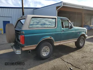 1996 Ford Bronco Custom with VIN 1FMEU15H4TLB59116, listed as a Copart auction lot 52989015 with 210,464 mi miles and Salvage title. Bid and sale history available at DreamBid. Image 3.