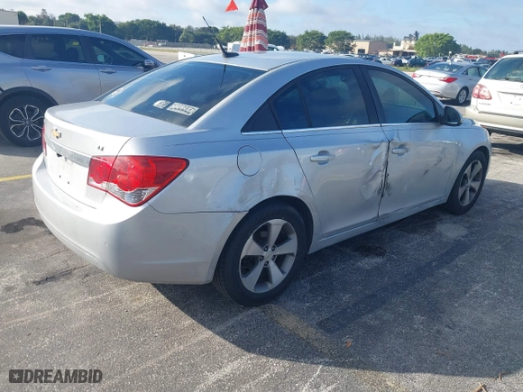 2011 Chevrolet Cruze LT w/2LT with VIN 1G1PG5S99B7128128, listed as a IAAI auction lot 41151880 with 195,832 mi miles. Bid and sale history available at carsss.com. Image 4.
