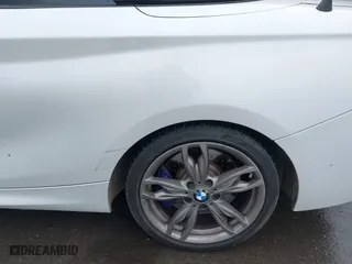 2015 BMW 2 Series M235i with VIN WBA1M1C53FV393300, listed as a IAAI auction lot 41926019 with 180,949 mi miles. Bid and sale history available at carsss.com. Image 19.
