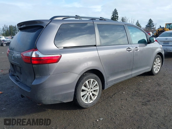 2015 Toyota Sienna Ltd with VIN 5TDDK3DC3FS124321, listed as a IAAI auction lot 41603367 with 120,922 mi miles. Bid and sale history available at carsss.com. Image 4.