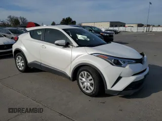 2019 Toyota C-HR XLE with VIN JTNKHMBX3K1036759, listed as a Copart auction lot 48520215 with 56,609 mi miles and Salvage Title. Bid and sale history available at DreamBid. Image 4.