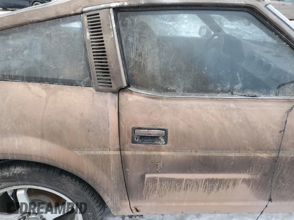 1979 Datsun 280ZX z VIN HS130137808, wystawiony jako Copart lot #43799165 z przebiegiem 28 995 mil mil oraz Tytuł czysty. Historia ofert i sprzedaży dostępna na DreamBid. Obrazek 10.
