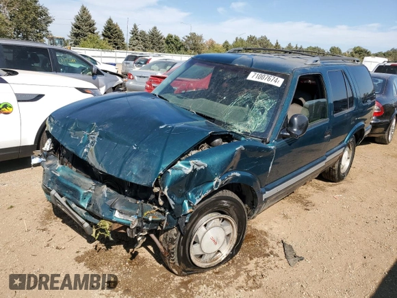 1996 GMC Jimmy SL with VIN 1GKCS13W0T2553905, listed as a Copart auction lot 71007674 with 169,513 mi miles and Salvage Title. Bid and sale history available at carsss.com. Image 1.