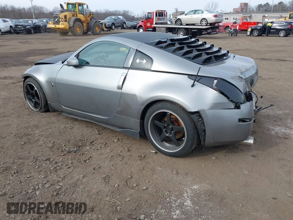 2003 Nissan 350Z Touring z VIN JN1AZ34E33T003711, wystawiony jako IAAI lot #41351191 z przebiegiem 167 503 mil mil oraz . Historia ofert i sprzedaży dostępna na DreamBid. Obrazek 3.