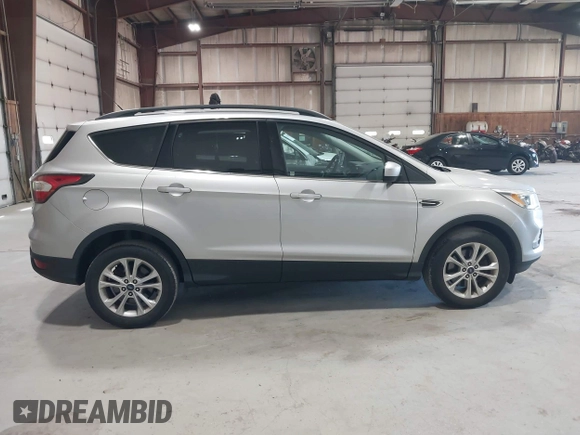 2017 Ford Escape SE with VIN 1FMCU9GD2HUA30860, listed as a IAAI auction lot 42146118 with 155,399 mi miles. Bid and sale history available at carsss.com. Image 13.
