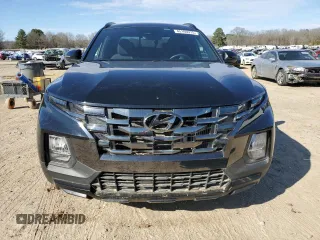 2023 Hyundai Santa Cruz Night Edition z VIN 5NTJCDAF3PH055739, wystawiony jako Copart lot #45106975 z przebiegiem Nie podano mil oraz Szkoda całkowita • Salvage title. Historia ofert i sprzedaży dostępna na DreamBid. Obrazek 5.