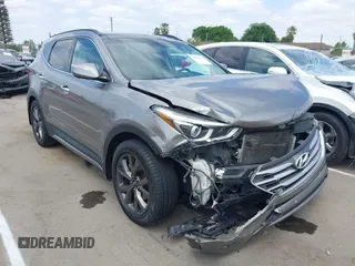 2017 Hyundai Santa Fe Ultimate z VIN 5XYZW4LA5HG495139, wystawiony jako IAAI lot #42066782 z przebiegiem 134 305 mil mil oraz . Historia ofert i sprzedaży dostępna na DreamBid. Obrazek 1.