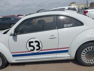 2015 Volkswagen Beetle 1.8T w/Sun z VIN 3VWJ07AT9FM636098, wystawiony jako IAAI lot #41991141 z przebiegiem 72 982 mil mil oraz . Historia ofert i sprzedaży dostępna na DreamBid. Obrazek 14.