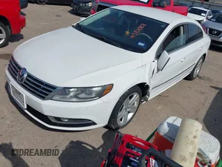 2013 Volkswagen CC Sport with VIN WVWBN7AN5DE503125, listed as a IAAI auction lot 41581088 with 128,964 mi miles and . Bid and sale history available at DreamBid. Image 2.