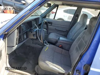 1996 Jeep Cherokee SE with VIN 1J4FT28S1TL108840, listed as a Copart auction lot 46951195 with 257,004 mi miles and Salvage Title. Bid and sale history available at carsss.com. Image 7.