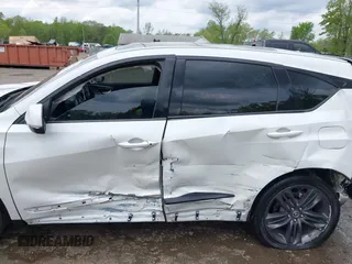 2021 Acura RDX w/A-Spec Package with VIN 5J8TC2H63ML048400, listed as a IAAI auction lot 42128393 with 37,496 mi miles and . Bid and sale history available at DreamBid. Image 14.