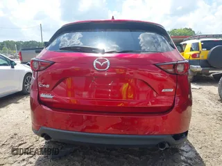 2018 Mazda CX-5 Grand Touring with VIN JM3KFADM4J0335913, listed as a IAAI auction lot 42326044 with 104,583 mi miles and . Bid and sale history available at DreamBid. Image 17.