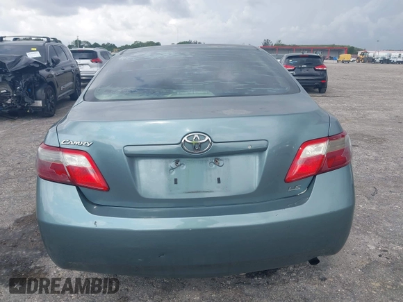 2007 Toyota Camry CE with VIN 4T1BE46K37U569515, listed as a IAAI auction lot 41974482 with 242,042 mi miles. Bid and sale history available at carsss.com. Image 16.