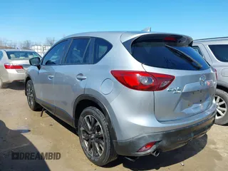 2016 Mazda CX-5 Grand Touring with VIN JM3KE4DY9G0795360, listed as a IAAI auction lot 41933991 with 176,373 mi miles. Bid and sale history available at carsss.com. Image 3.