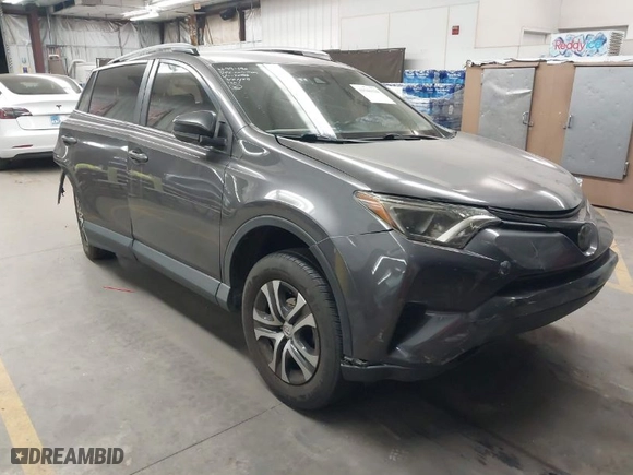 2017 Toyota RAV4 LE with VIN JTMBFREV9HJ132888, listed as a IAAI auction lot 41946329 with 100,982 mi miles. Bid and sale history available at carsss.com. Image 1.