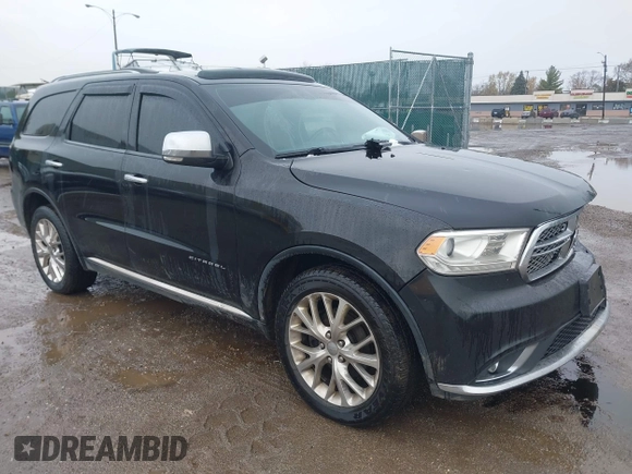 2014 Dodge Durango Citadel with VIN 1C4RDJEG5EC466164, listed as a IAAI auction lot 40936279 with 259,102 mi miles and . Bid and sale history available at DreamBid. Image 1.