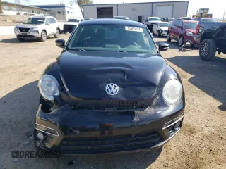 2014 Volkswagen Beetle Turbo R-Line with VIN 3VWVT7AT4EM606319, listed as a Copart auction lot 70489824 with Not Provided miles and Salvage Title. Bid and sale history available at DreamBid. Image 5.