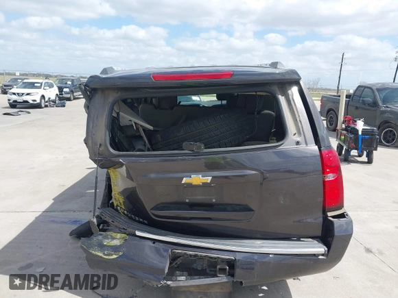 2015 Chevrolet Suburban LTZ with VIN 1GNSCKKC9FR500933, listed as a IAAI auction lot 41830980 with 169,217 mi miles and . Bid and sale history available at DreamBid. Image 15.