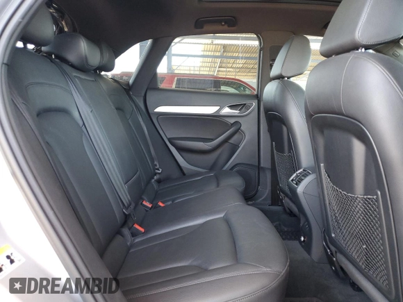 2018 Audi Q3 Premium with VIN WA1ECCFS0JR004256, listed as a Copart auction lot 56906885 with 66,581 mi miles and Salvage title. Bid and sale history available at DreamBid. Image 11.