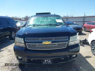 2011 Chevrolet Suburban LTZ with VIN 1GNSKKE33BR380376, listed as a IAAI auction lot 41825445 with 228,715 mi miles and . Bid and sale history available at DreamBid. Image 13.