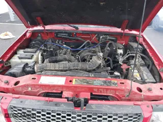 2003 Ford Ranger XL with VIN 1FTYR14V13PA87777, listed as a IAAI auction lot 41771784 with 155,826 mi miles. Bid and sale history available at carsss.com. Image 10.