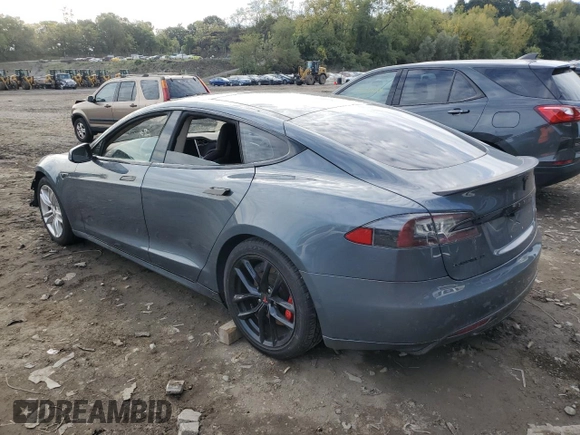 2014 Tesla Model S 60 with VIN 5YJSA1H14EFP28471, listed as a Copart auction lot 73715834 with 99,442 mi miles and Clean Title. Bid and sale history available at DreamBid. Image 2.
