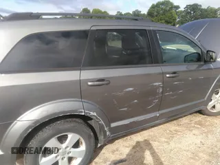 2012 Dodge Journey SXT with VIN 3C4PDCBG9CT153241, listed as a IAAI auction lot 42640265 with 184,719 mi miles and . Bid and sale history available at DreamBid. Image 6.