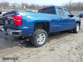 2017 Chevrolet Silverado 1500 LT with VIN 1GCVKREC1HZ273513, listed as a IAAI auction lot 41875769 with 153,164 mi miles. Bid and sale history available at carsss.com. Image 4.