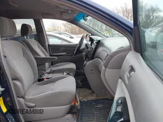 2005 Toyota Sienna LE with VIN 5TDBA23C25S048997, listed as a IAAI auction lot 41883065 with 245,085 mi miles. Bid and sale history available at carsss.com. Image 5.