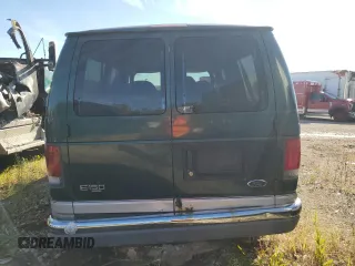2000 Ford Econoline Passenger XL with VIN 1FMRE11L9YHB19715, listed as a Copart auction lot 69192734 with 237,129 mi miles and Salvage Title. Bid and sale history available at carsss.com. Image 6.