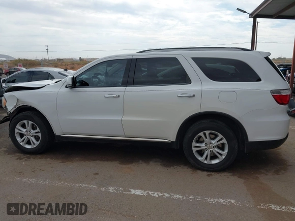 2013 Dodge Durango Crew with VIN 1C4RDHDG0DC535397, listed as a IAAI auction lot 41036306 with 163,571 mi miles. Bid and sale history available at carsss.com. Image 14.