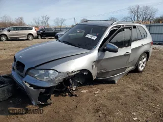 2012 BMW X5 35i with VIN 5UXZV4C51CL764495, listed as a Copart auction lot 48718915 with Not provided miles and Salvage title. Bid and sale history available at DreamBid. Image 1.