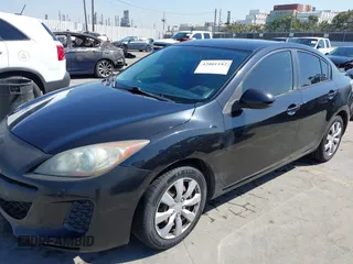 2013 Mazda 3 i Sport with VIN JM1BL1U7XD1702243, listed as a IAAI auction lot 42001182 with 115,257 mi miles and . Bid and sale history available at DreamBid. Image 6.