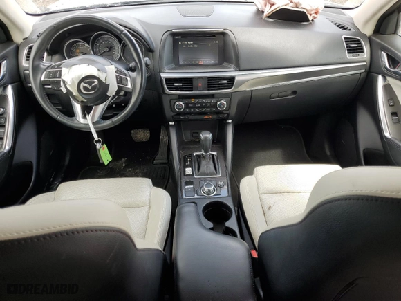 2016 Mazda CX-5 Grand Touring with VIN JM3KE2DY3G0863964, listed as a Copart auction lot 50790985 with 62,766 mi miles and Salvage Title. Bid and sale history available at carsss.com. Image 8.