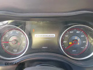 2019 Dodge Charger SXT with VIN 2C3CDXBG2KH658121, listed as a IAAI auction lot 41781901 with 125,634 mi miles. Bid and sale history available at carsss.com. Image 7.