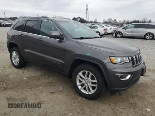 2017 Jeep Grand Cherokee Laredo with VIN 1C4RJFAG9HC750302, listed as a Copart auction lot 47601615 with 101,729 mi miles and Salvage Title. Bid and sale history available at carsss.com. Image 4.