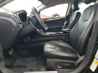 2016 Ford Fusion Titanium z VIN 3FA6P0K90GR399896, wystawiony jako Copart lot #63504265 z przebiegiem 37 066 mil mil oraz Szkoda całkowita • Salvage title. Historia ofert i sprzedaży dostępna na DreamBid. Obrazek 7.